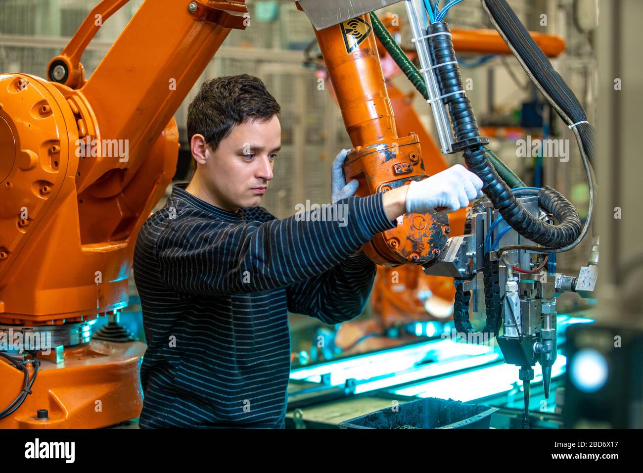 robotization of modern industry in the factory. Introduction of new