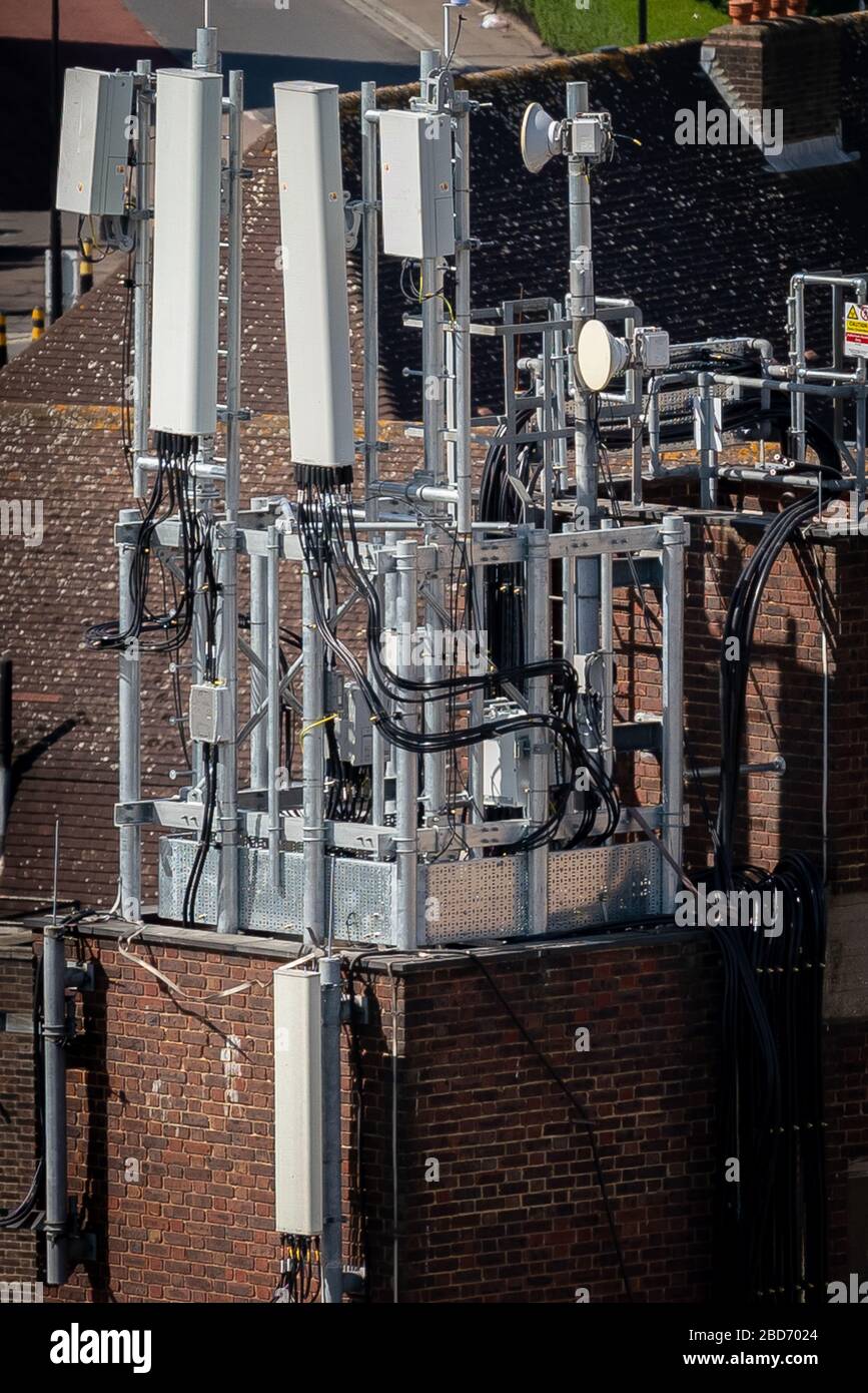 London, UK. 7th April, 2020. 5G mobile provider masts newly installed to the roofs of a south east London housing estate. Credit: Guy Corbishley/Alamy Live News Stock Photo