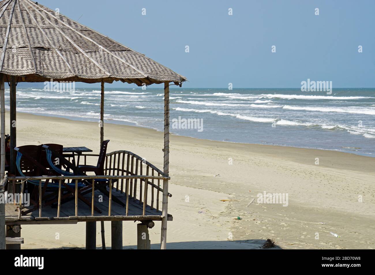wooden beach hut on a lonely naturl beach Stock Photo