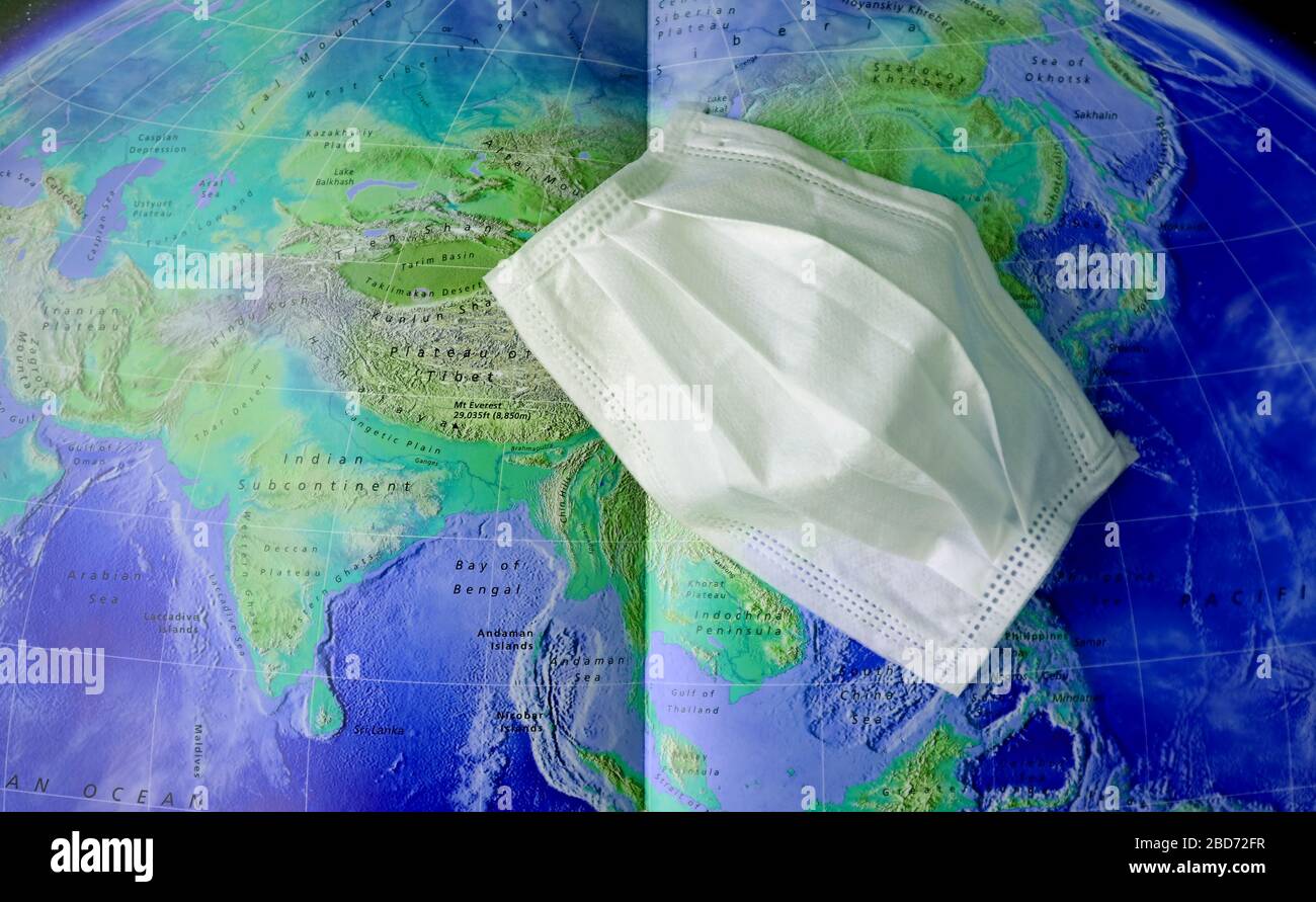 Masked Global Map Concept of prevent the global spread of infection by wearing face mask ...