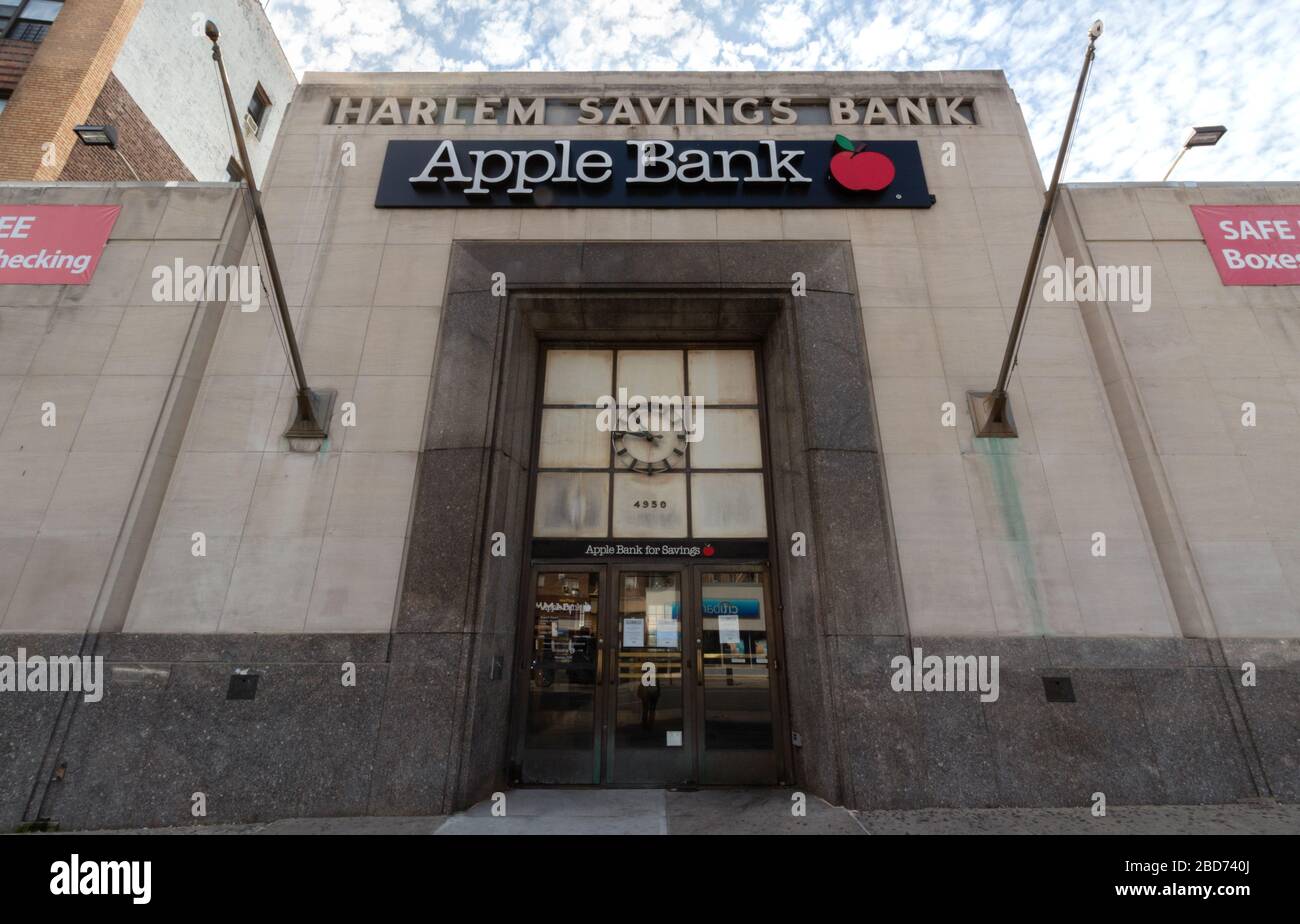 facade of the Apple Bank branch in Inwood. Founded in 1863 as the Harlem Savings Bank, that name can still be seen at the top of the building Stock Photo