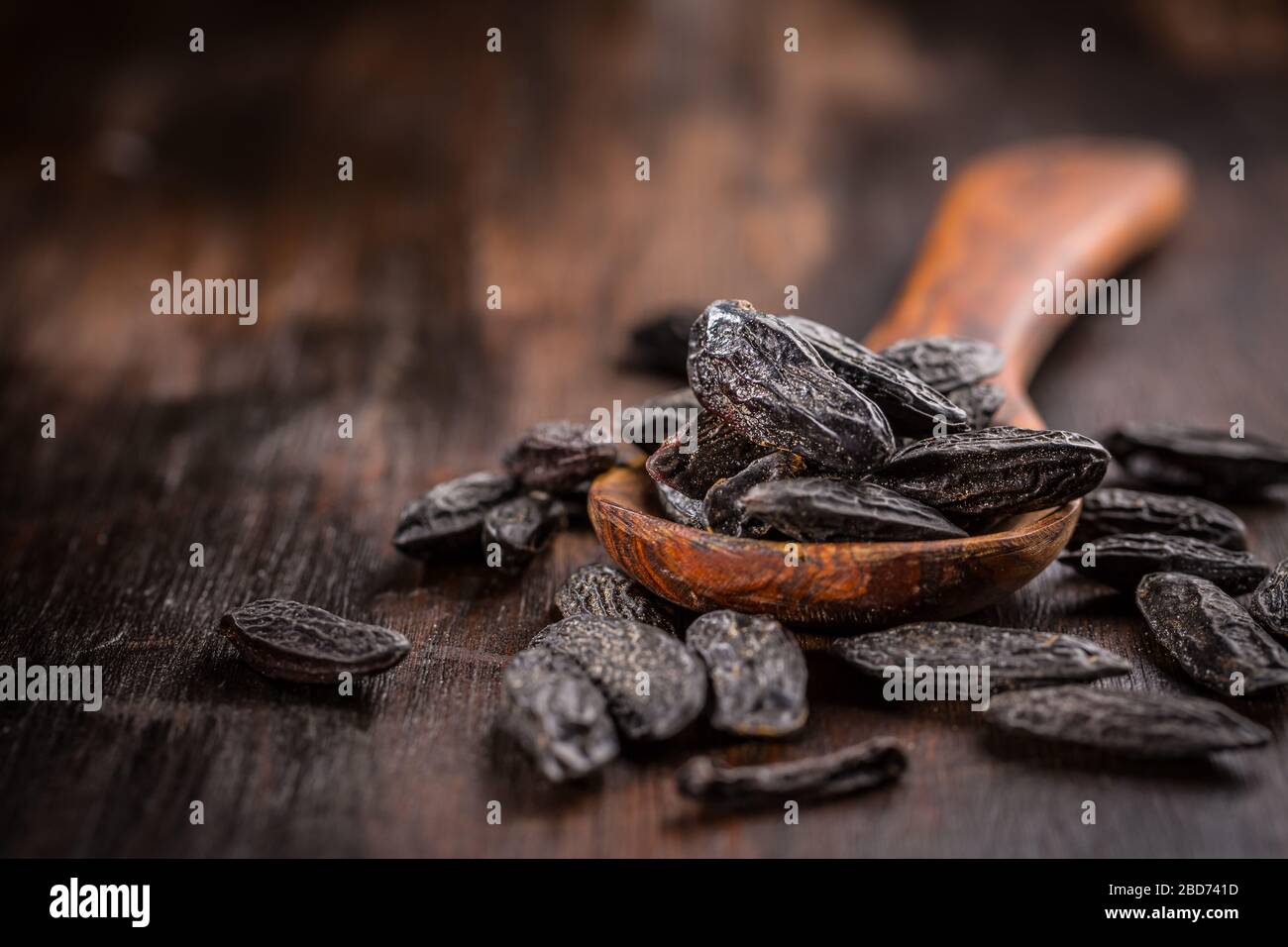 Fragrant tonka beans for baking and cooking on dark background Stock Photo Alamy