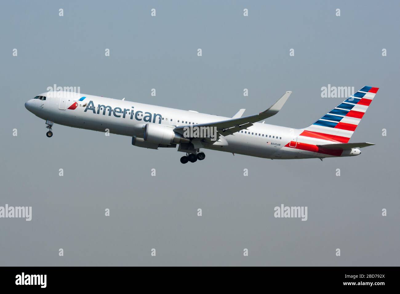 Paris / France - April 24, 2015: American Airlines Boeing 767-300 N345AN passenger plane departure and take off at Paris Charles de Gaulle Airport Stock Photo