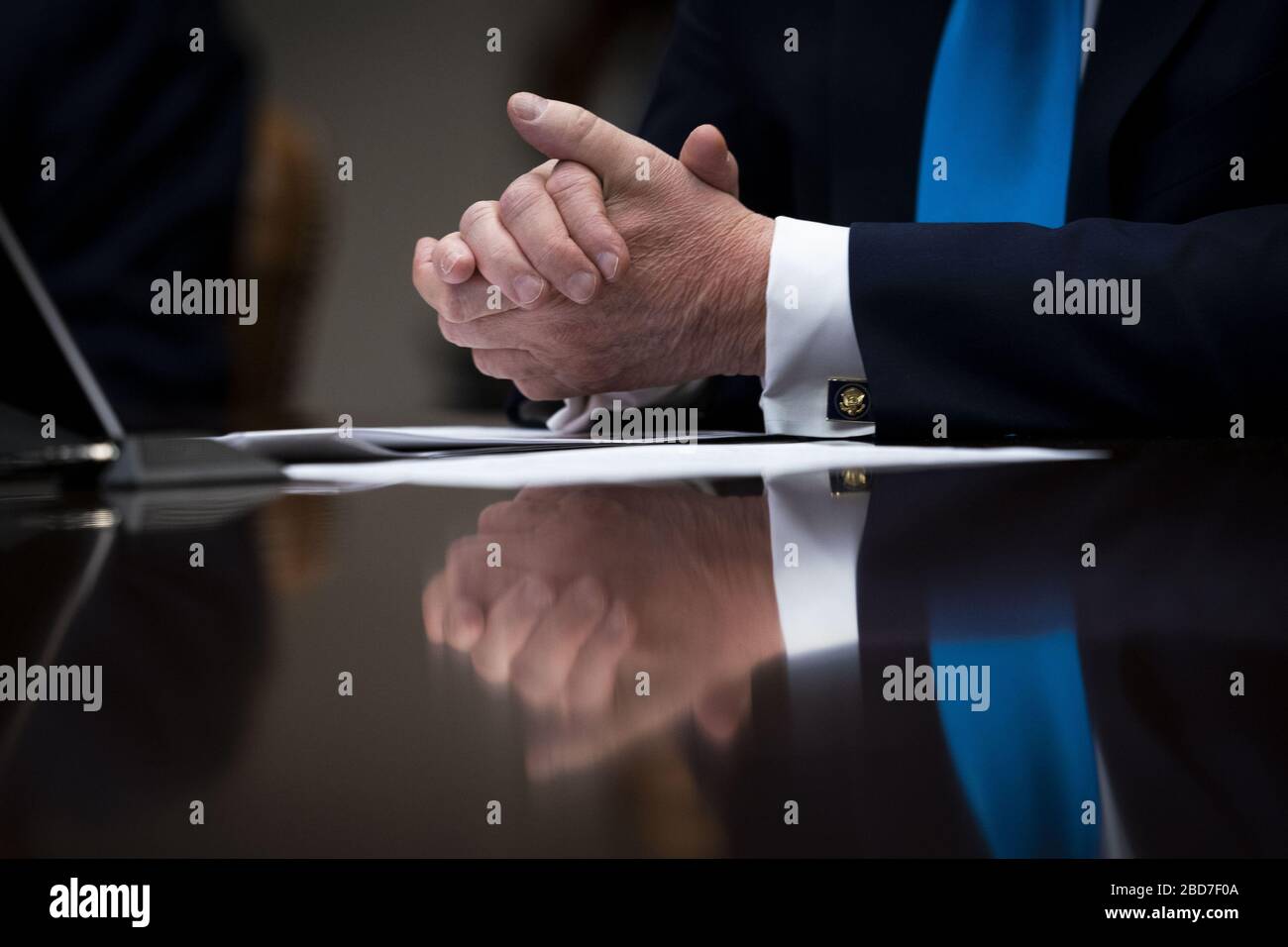 Washington, United States. 07th Apr, 2020. President Donald Trump's hands are seen as he makes remarks as he participates in a Small Business Relief Update at the White House on Tuesday, April 7, 2020 in Washington, DC President Donald Trump announced in March that companies affected by the coronavirus will be given $50 billion more in low-interest loans federally guaranteed by the Small Business Administration. Photo by Doug Mills/UPI Credit: UPI/Alamy Live News Stock Photo