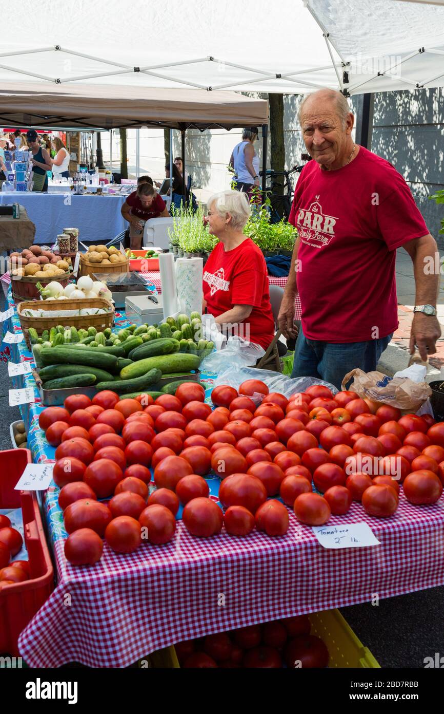 Venders attend to their business at Fort Wayne's Farmers Market in downtown Fort Wayne, Indiana, USA. Stock Photo