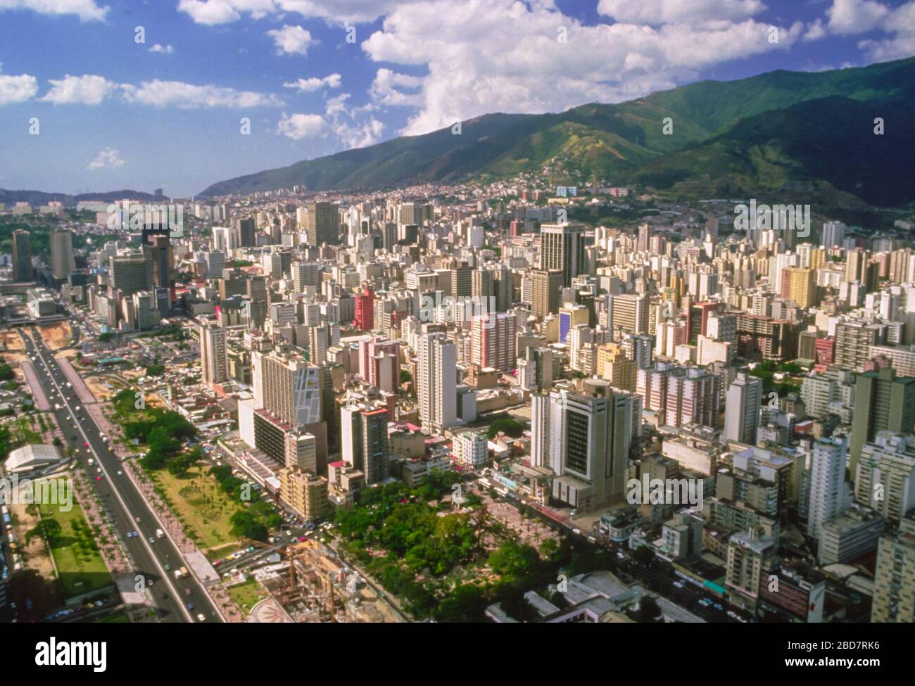 CARACAS, VENEZUELA - Tall buildings in city of Caracas and El Avila Park, upper right. Stock Photo