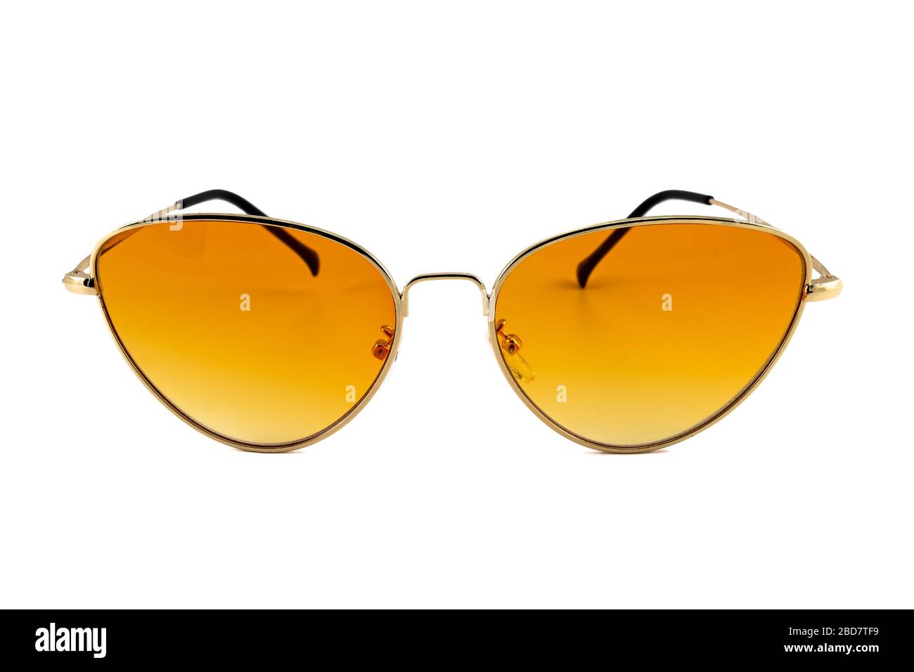 Orange cat eye sunglasses with gold wrap around frames isolated on