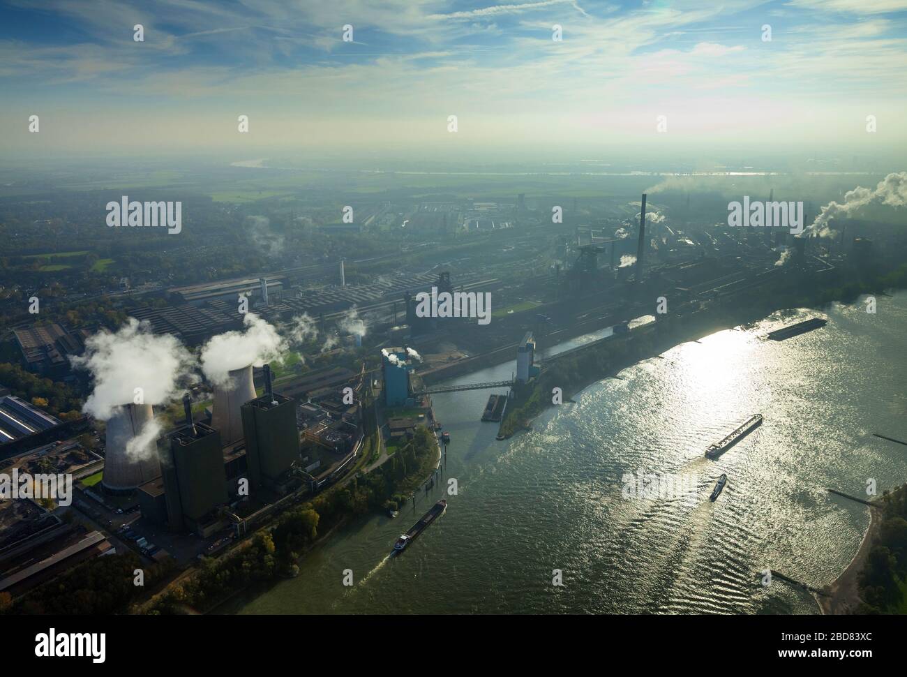 Industrial area of the HKM - Krupp Mannesmann GmbH at the riverside of the Rhine in Duisburg with power plant Duisburg-Huckingen, 28.10.2014, aerial view, Germany, North Rhine-Westphalia, Ruhr Area, Duisburg Stock Photo