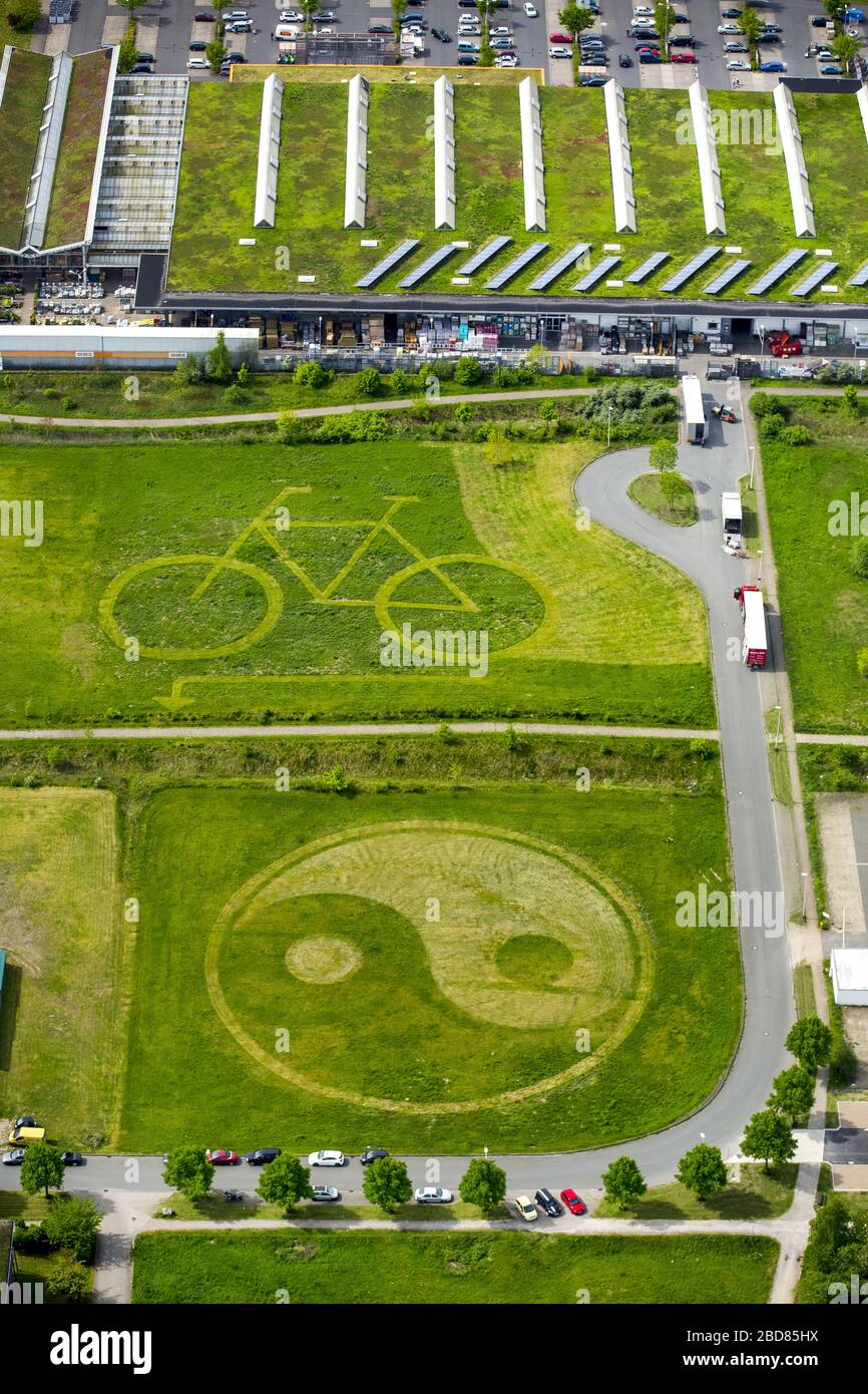 , meadow with mowed bicycle and ying-yang character, 11.05.2015, aerial view, Germany, North Rhine-Westphalia, Ruhr Area, Hamm Stock Photo