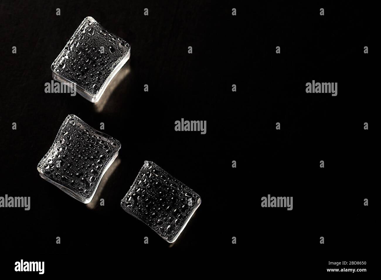 Colored banner with fresh ice cubes and reflections Stock Photo