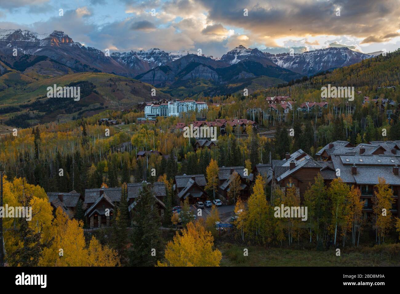 Mountains, hotels, and aspen at sunset from the gondola between Mountain Village and Telluride