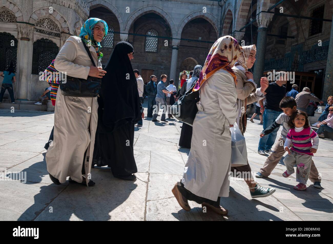 ISTANBUL MAY 4, 2010 Turkish families walk in traditional clothing
