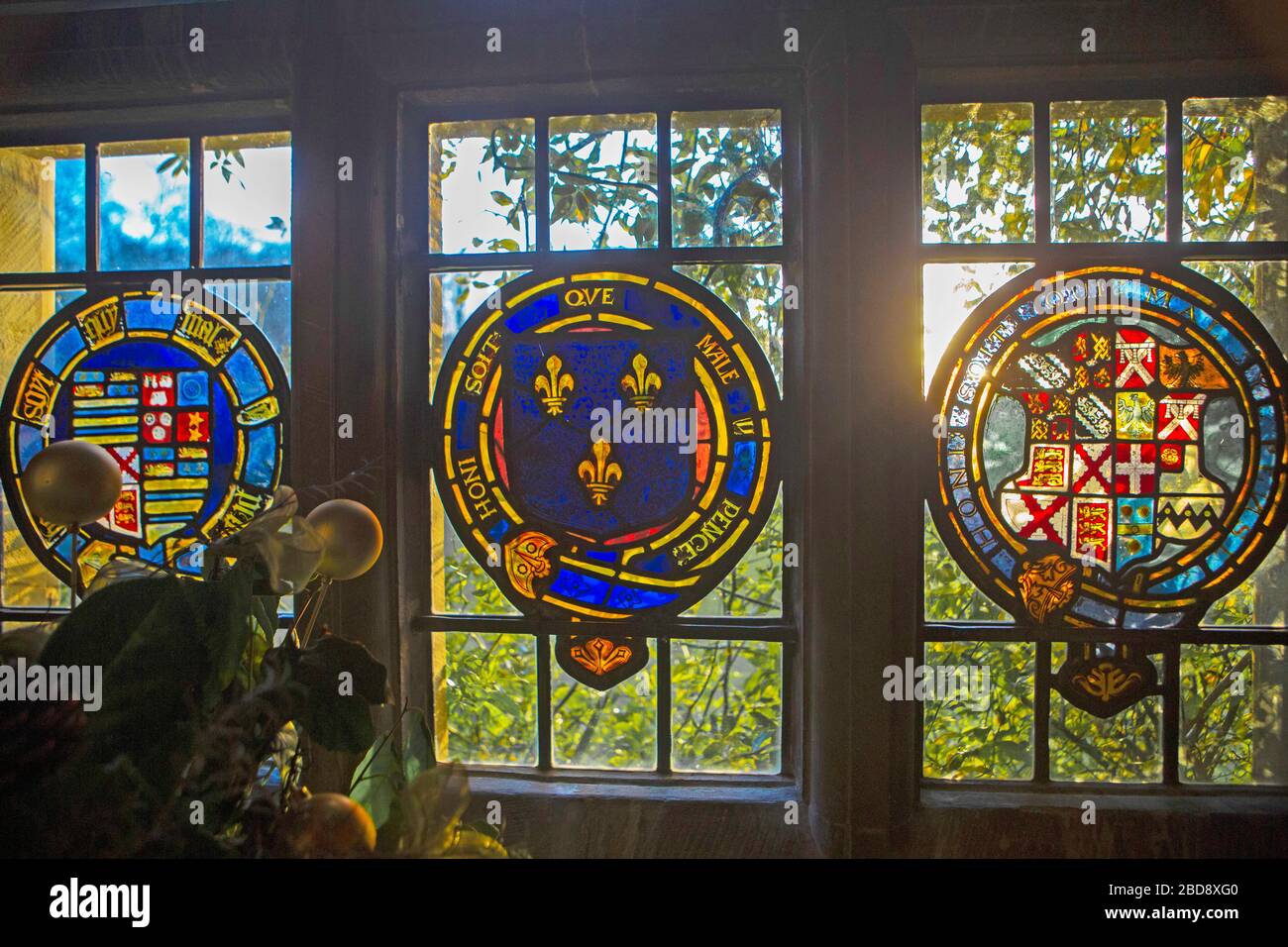 Stained glass heraldic window at Chawton House Stock Photo