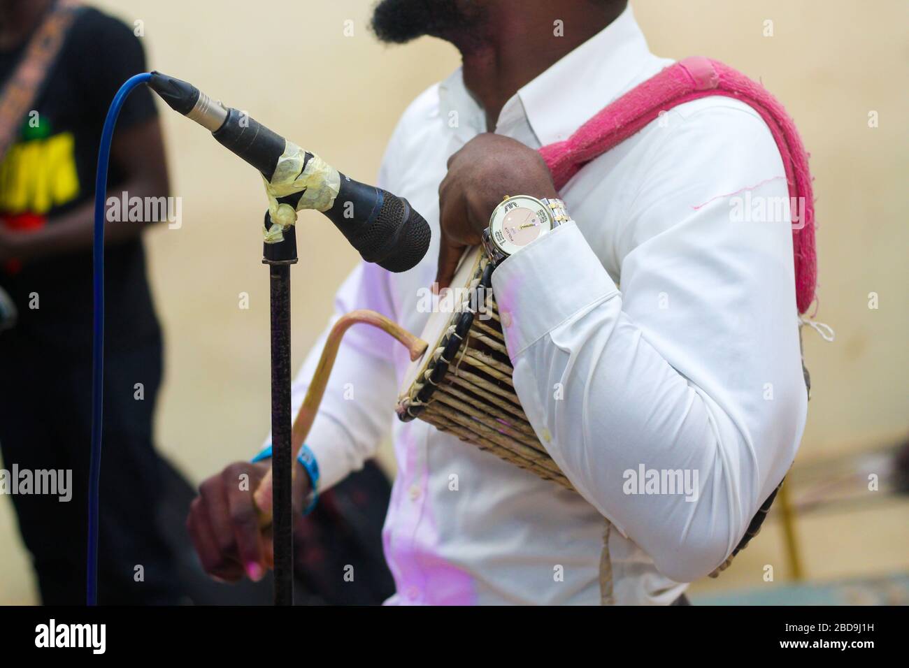 Someone Playing Talking Drum Stock Photo Alamy