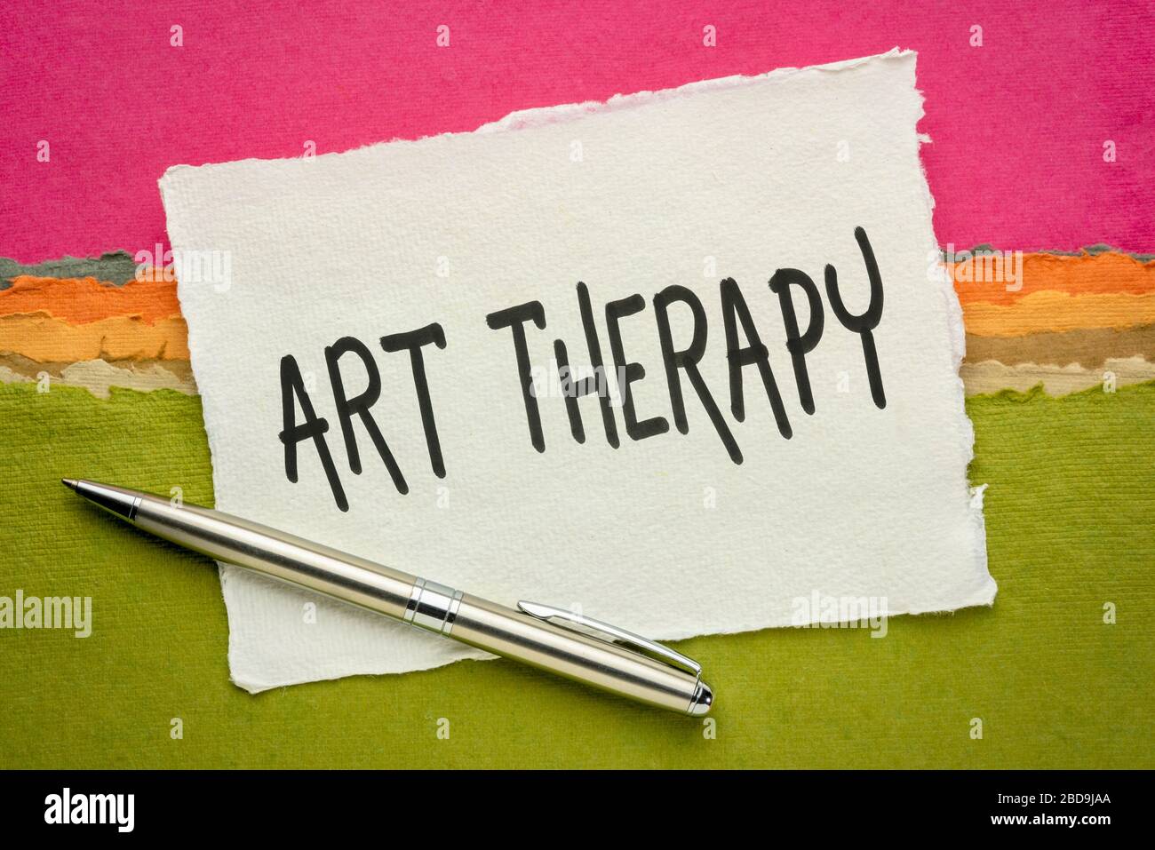 art therapy handwriting on a handmade khadi paper against colorful