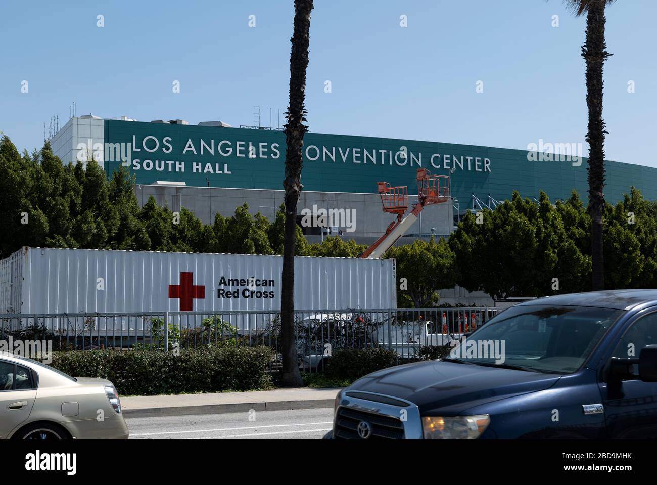 Los Angeles, CA/USA - April 1, 2020: Red Cross trucks lined up at the Los Angeles Convention Center which has become a field hospital for coronavirus Stock Photo