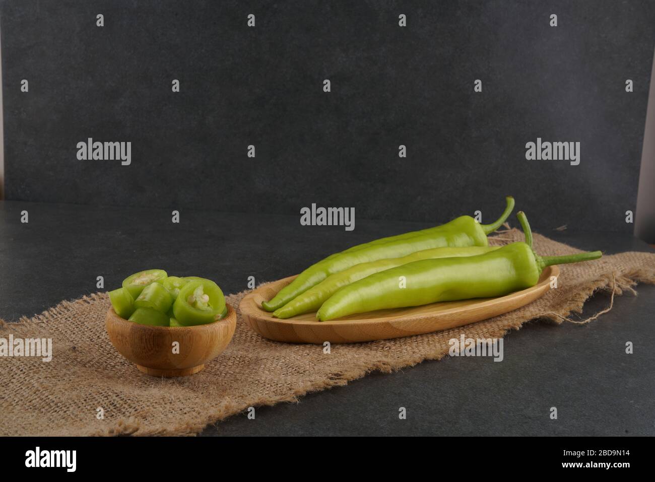 Fresh green pepper on dark background Stock Photo
