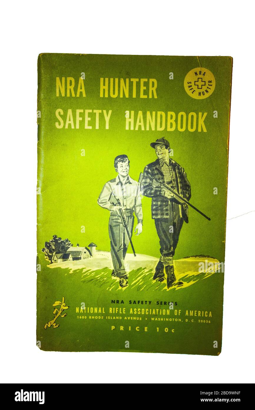 The National Rifle Association Hunter Safety Handbook from 1959 a revision of the 1957 handbook Stock Photo