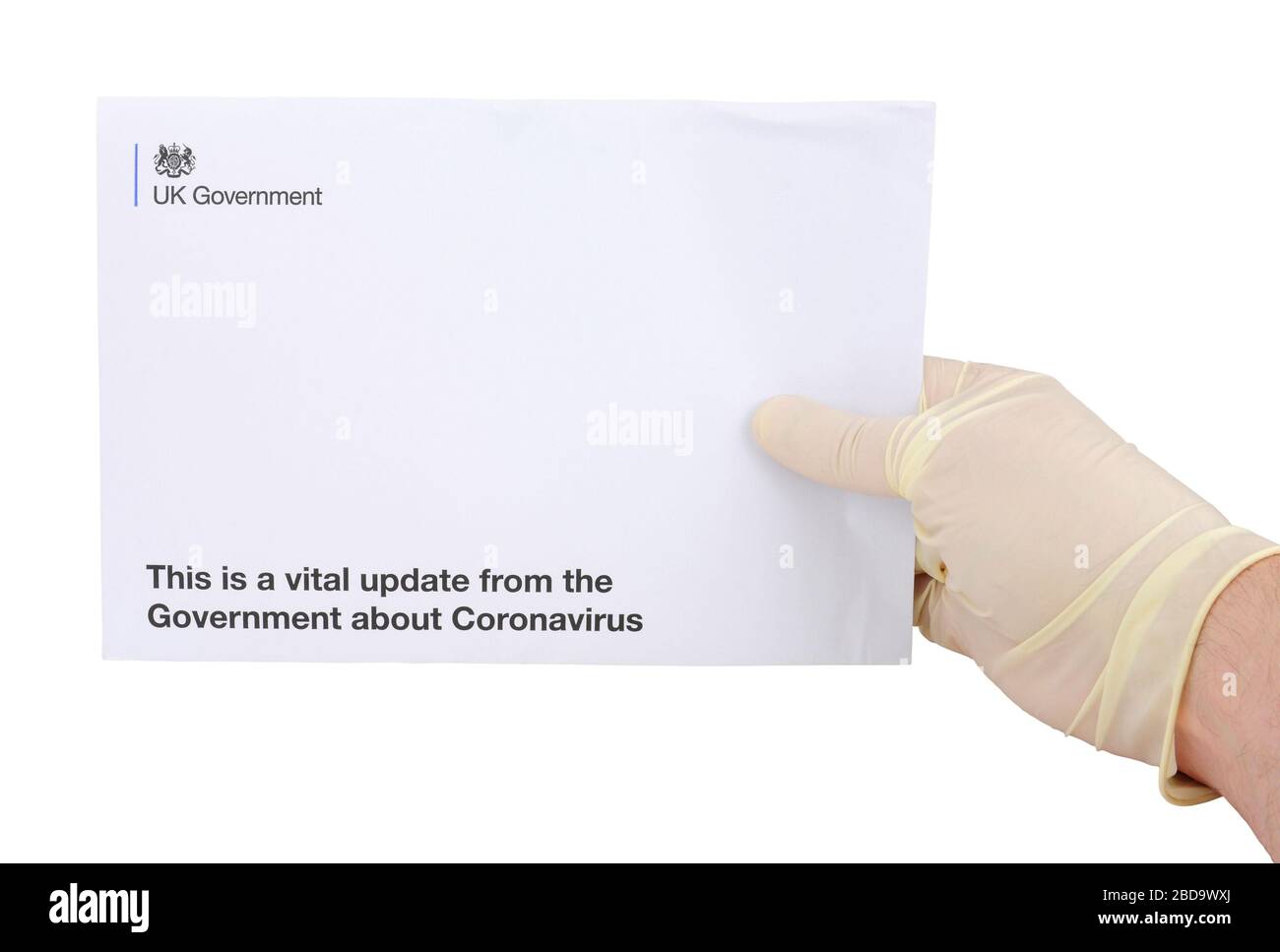 Letter envelope from United Kingdom Government to every household in UK with vital updates about Coronavirus and lock down rules, isolated on a white Stock Photo
