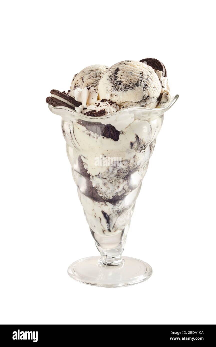 Glass parfait glass with Oreo handmade ice cream garnished with whole cookies isolated on white