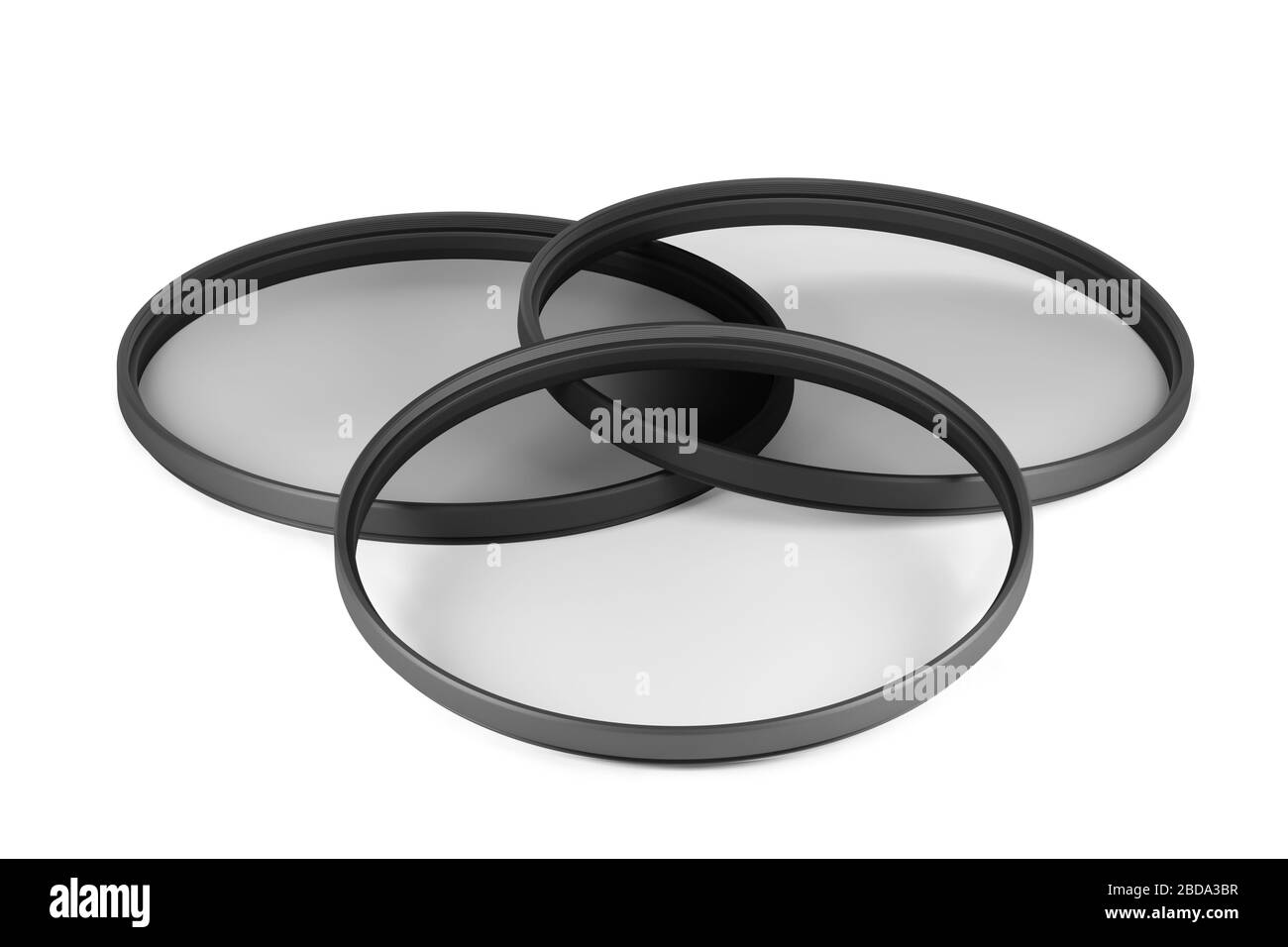 Three slim neutral density or ND filters isolated on white background (3d model rendered illustration) Stock Photo