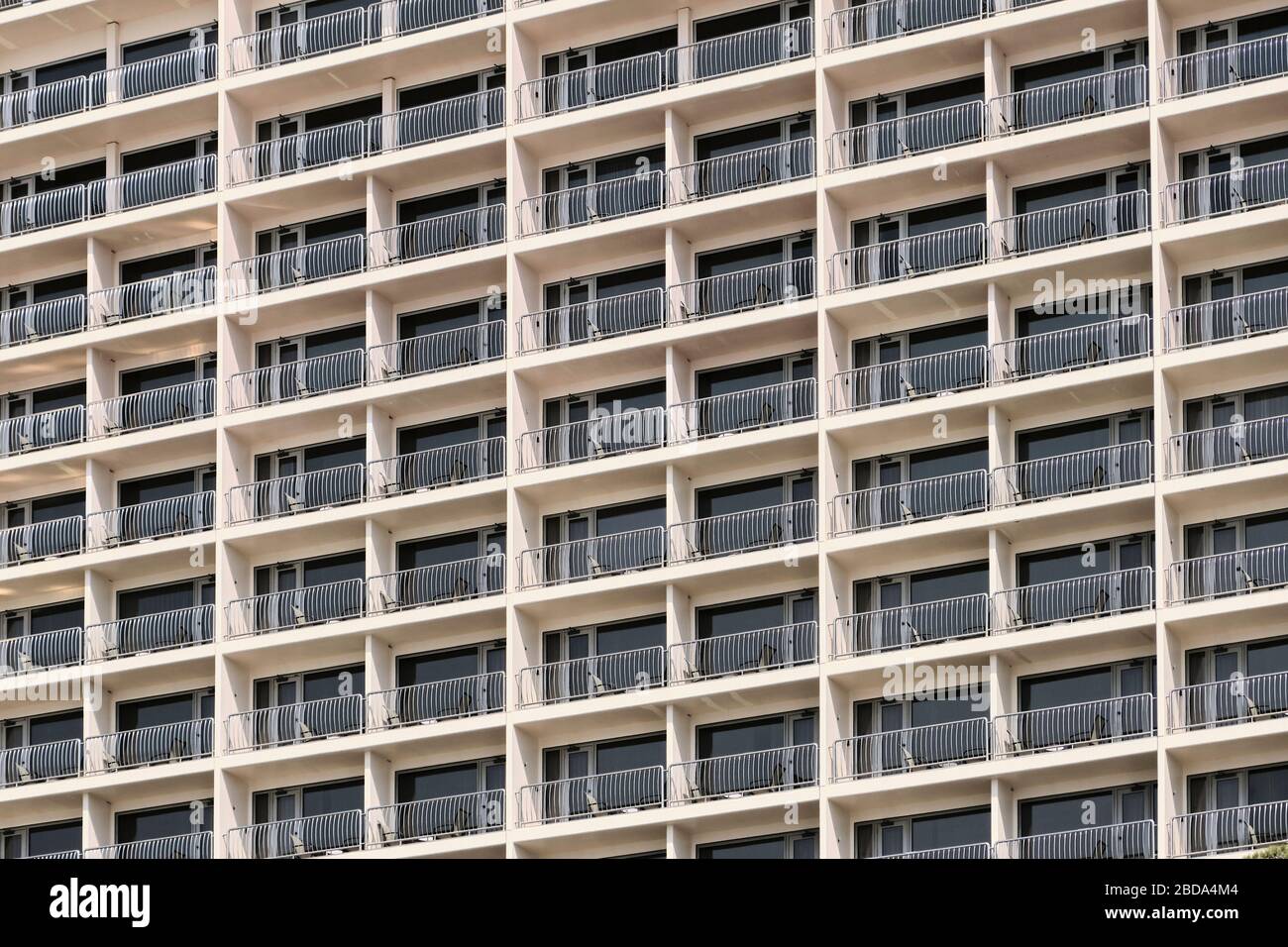 Closeup of a balcony pattern on an urban building Stock Photo