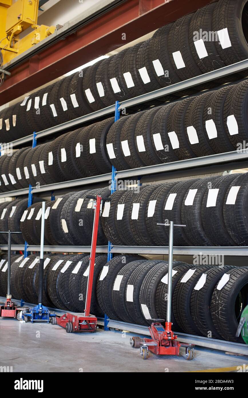 Assorted new automotive road tires showing a variety of tread patterns
