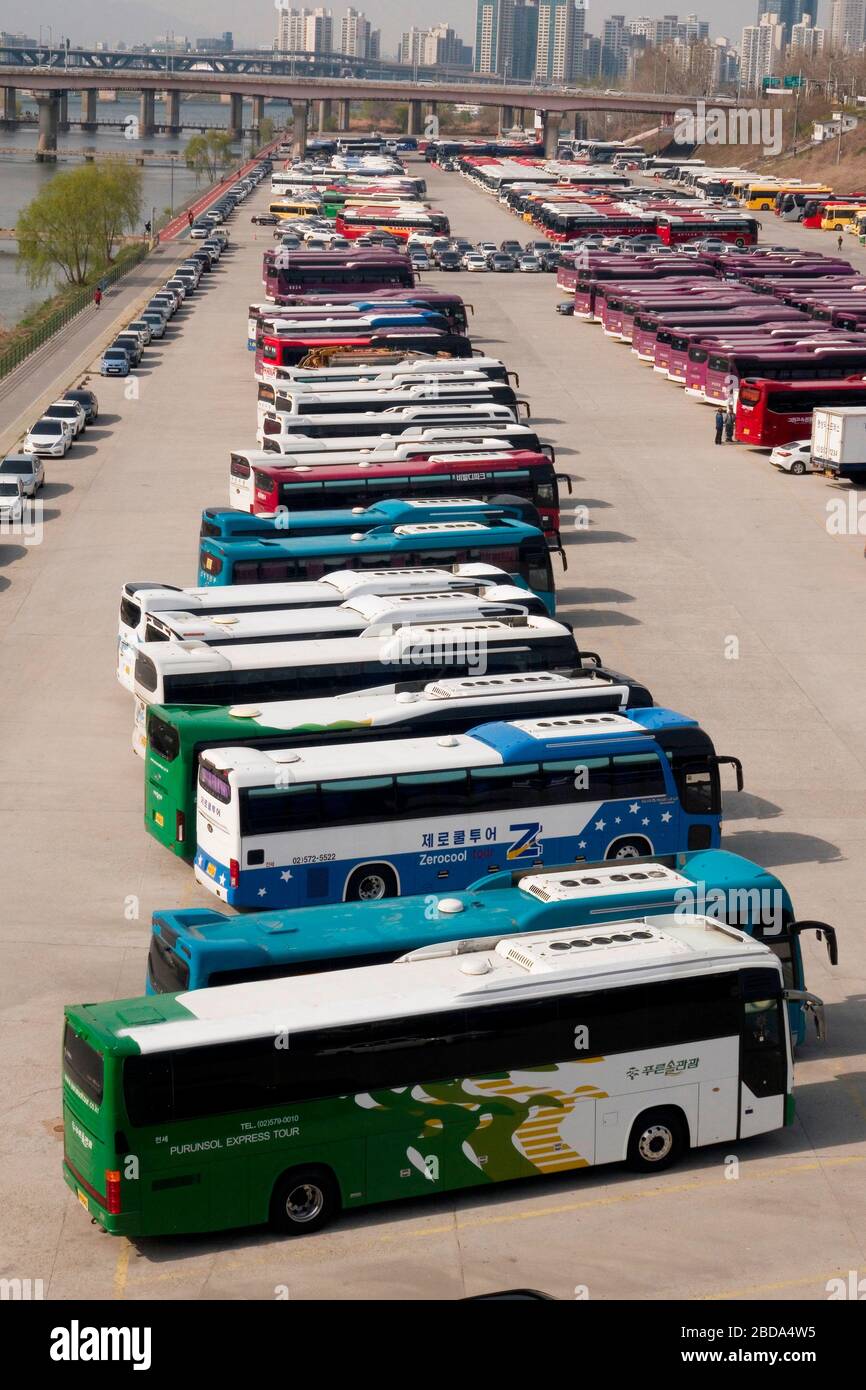 Tourism hit by the new coronavirus, Apr 6, 2020 : Tour buses which stopped running amid the spread of the COVID-19 are seen at a parking lot in Seoul, South Korea. South Korean Prime Minister Chung Sye-Kyun said on April 8 that the country will temporarily suspend visa-free entry and visa waiver programs with countries imposing entry bans on Koreans as South Korea tries to block imported cases of the COVID-19 coronavirus, local media reported. Credit: Lee Jae-Won/AFLO/Alamy Live News Stock Photo