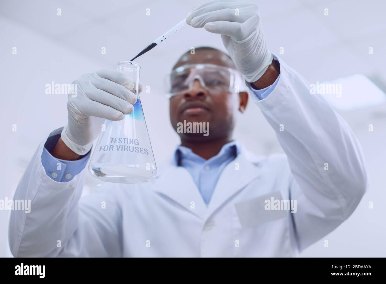 Determined biologist working with tubes in the lab Stock Photo
