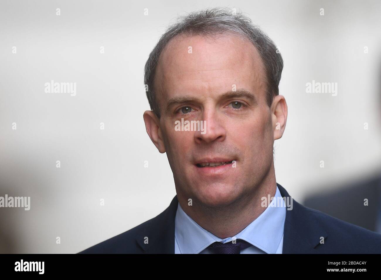 Foreign Secretary Dominic Raab, who is taking charge of the Government's response to the coronavirus crisis after Prime Minister Boris Johnson was admitted to intensive care Monday, arrives in Downing Street, London. Stock Photo
