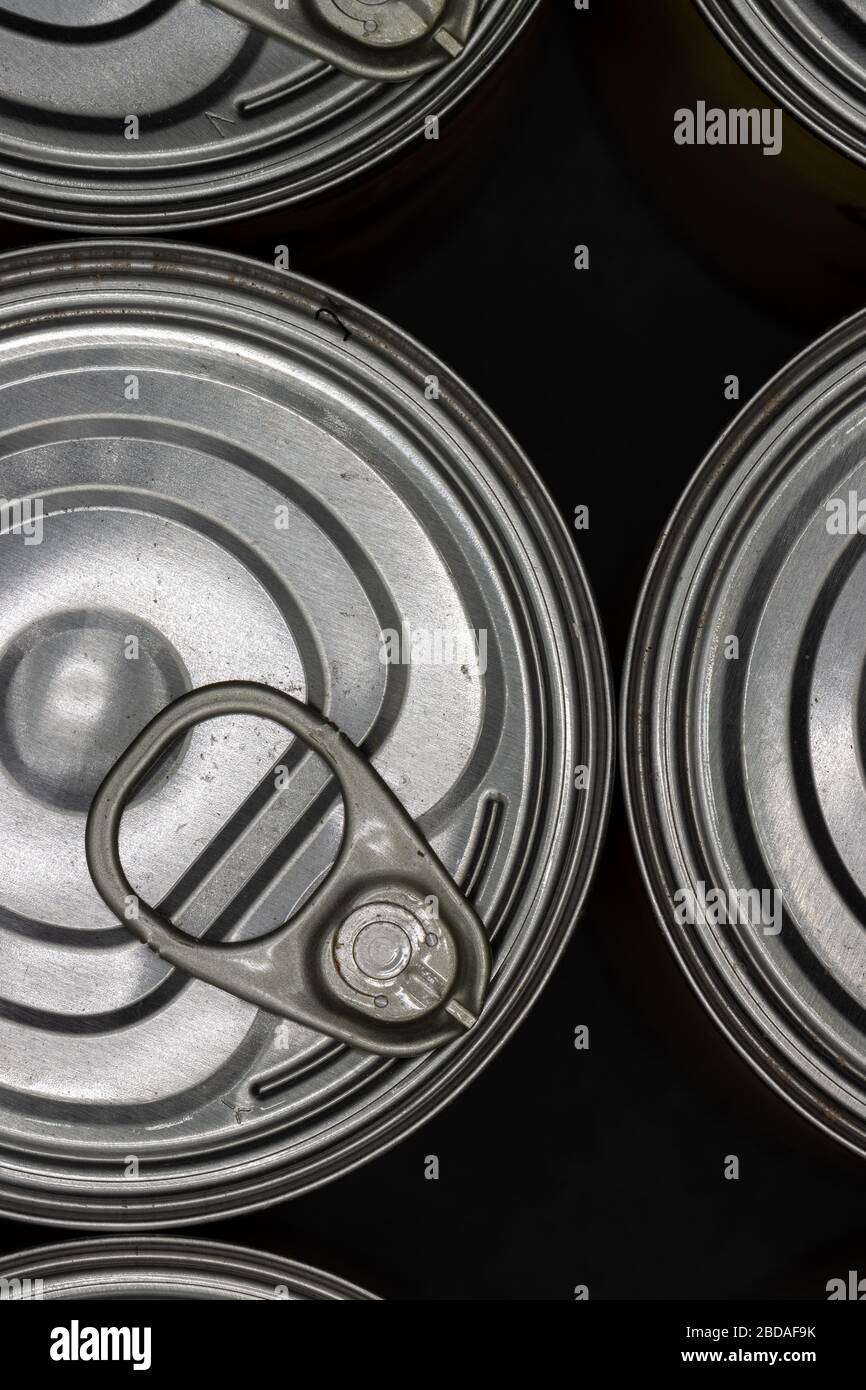 Close up flat lay of canned food stockpiled in prepper pantry Stock Photo