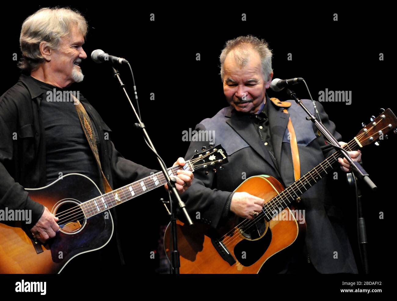 American folk singers and songwriters Kris Kristofferson (left) and