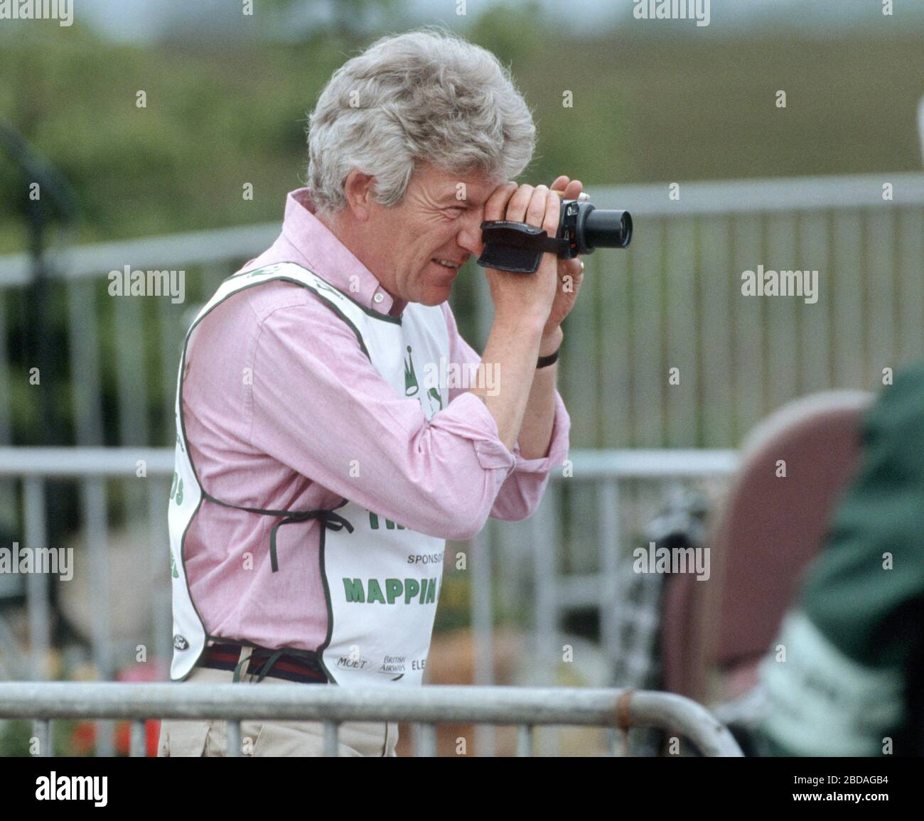 Patrick Lichfield with his Olympus Camera at the Epsom derby, Epsom, England June 1992 Stock Photo