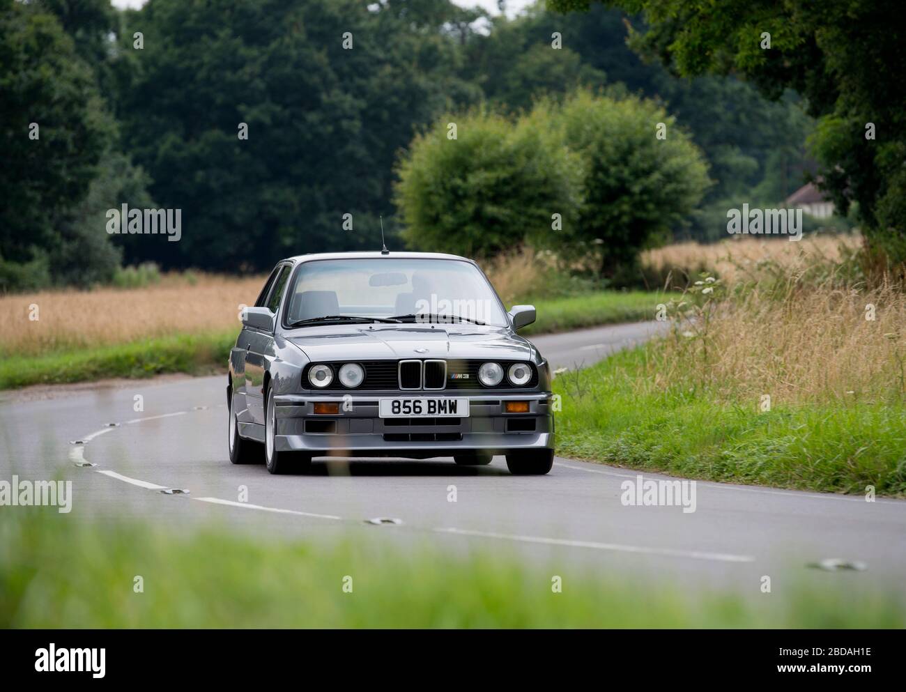 BMW E30 M3 1980s super saloon in Dolphin Grey Stock Photo - Alamy