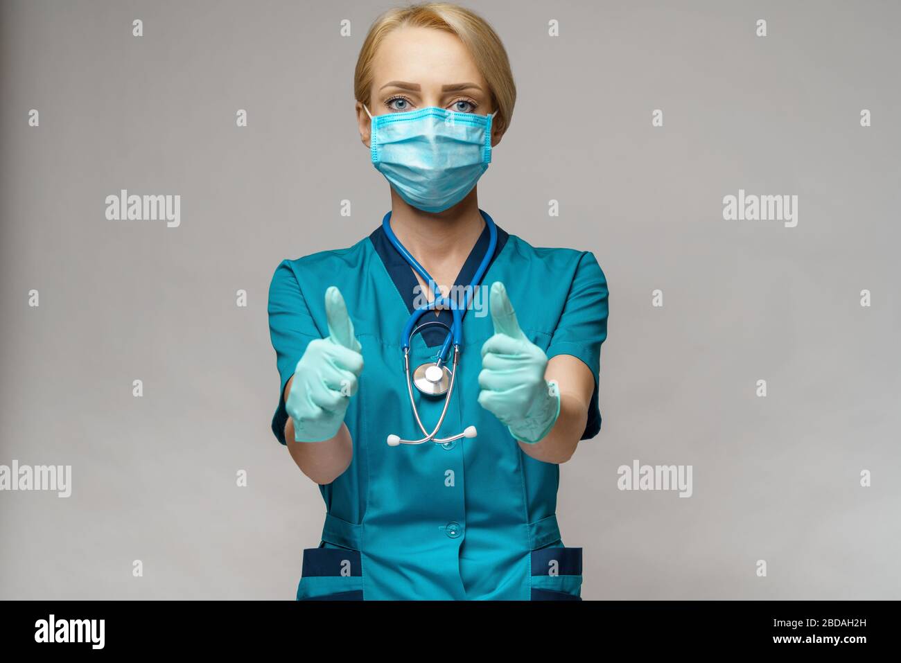 medical doctor nurse woman wearing protective mask and latex gloves ...