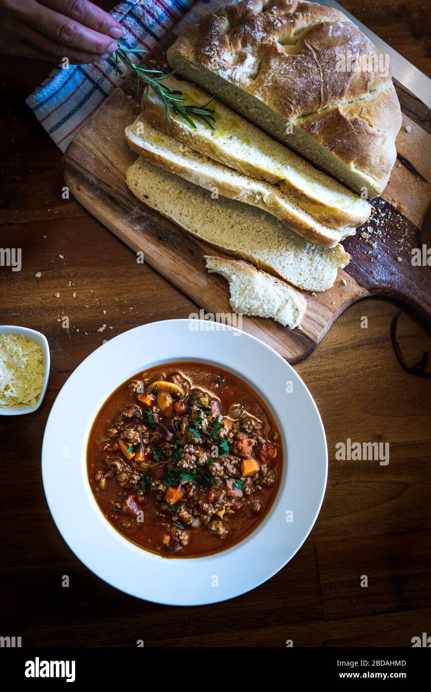 Beef Mince, vegetable, white wine and stock sauce with home made loaf