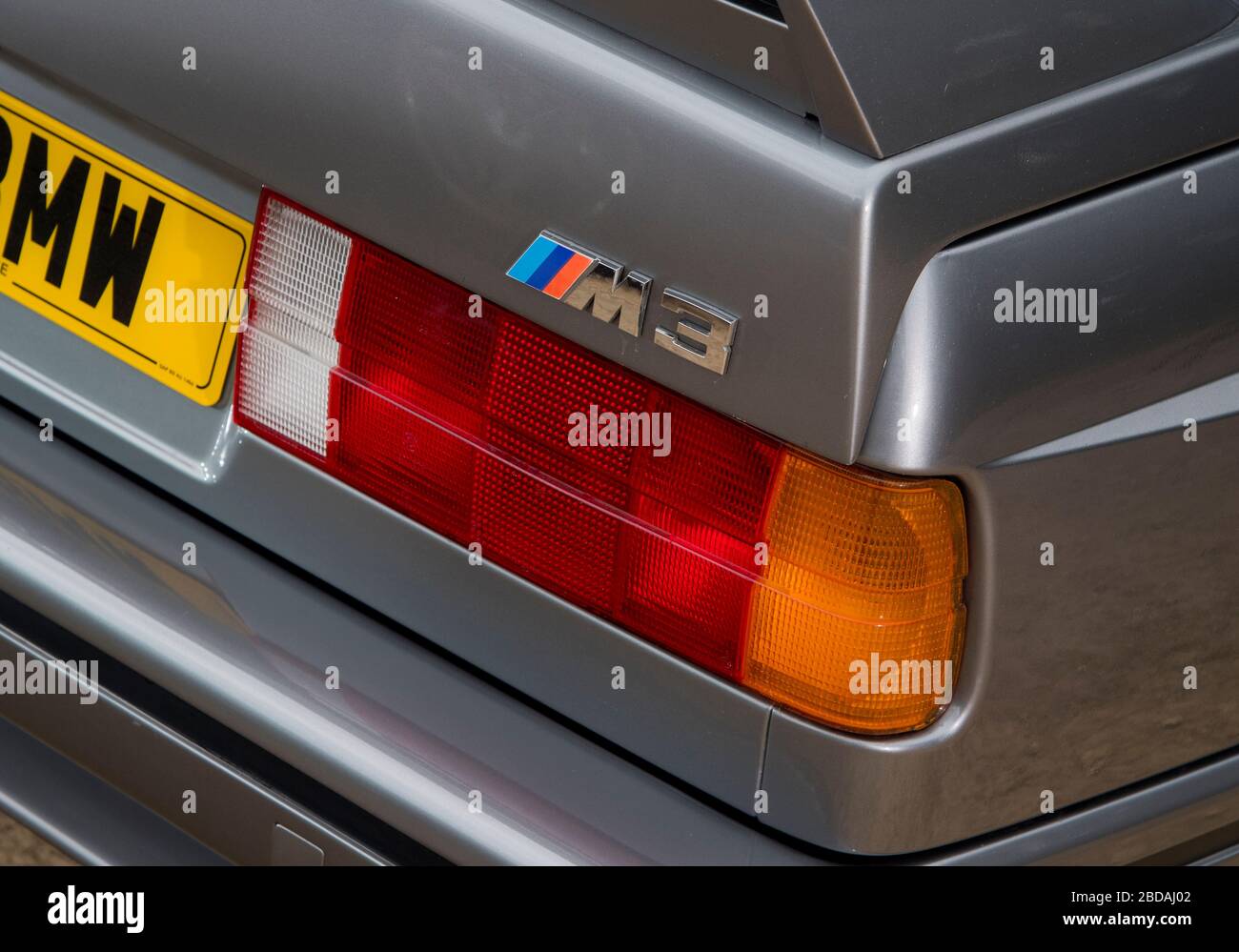 BMW E30 M3 1980s super saloon in Dolphin Grey Stock Photo - Alamy