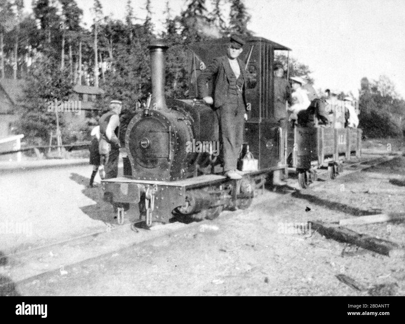 'English: 2 ft narrow gauge Black Hawthorn locomotive No 475 'LILLY' built in 1879 of the Boeylestaad copper mine railway near Arendal in south Norway, which closed down in 1877. Their 2 ft narrow gauge Black Hawthorn locomotive No 475 'LILLY' was built in 1879 . When the mine closed in 1877,'LILLY' was stored in Kristiania (Oslo) for some years before it was sold to Sweden and the Netrabybanan (NAEJ) in far south Sweden, where it worked with maintaining the line. This photo was taken at NAEJ in Sweden. Subsequently, 'LILLY' was sold to the governmental construction company Vattenfall, where i Stock Photo