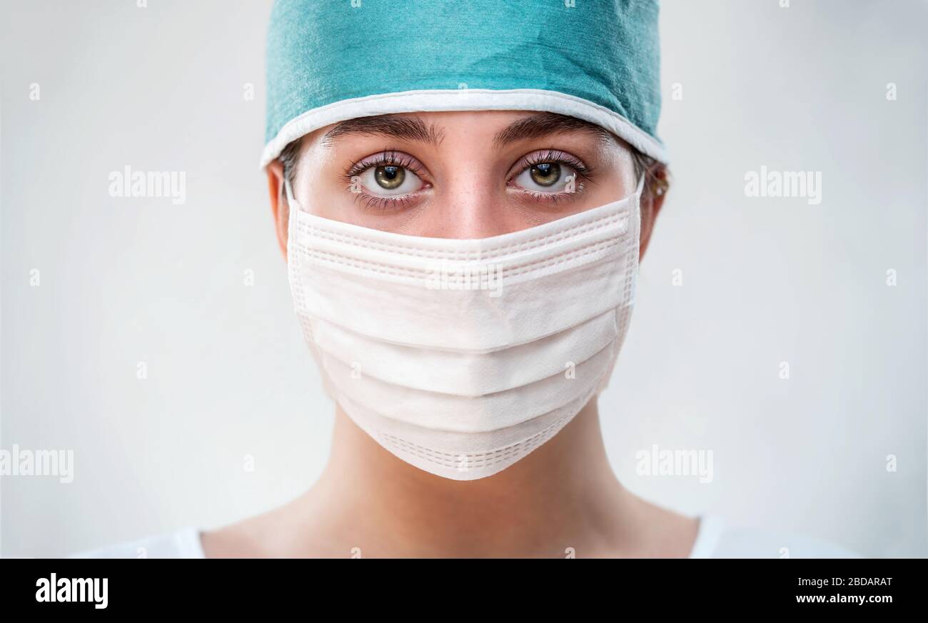Close up of female doctor wearing face mask with copy space Stock Photo
