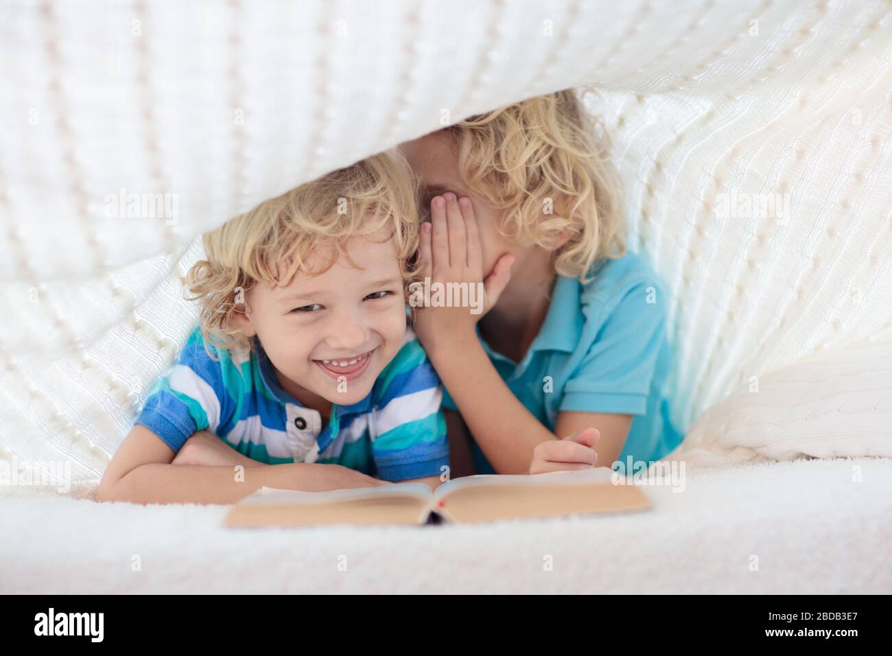 Brothers reading bed hires stock photography and images Alamy