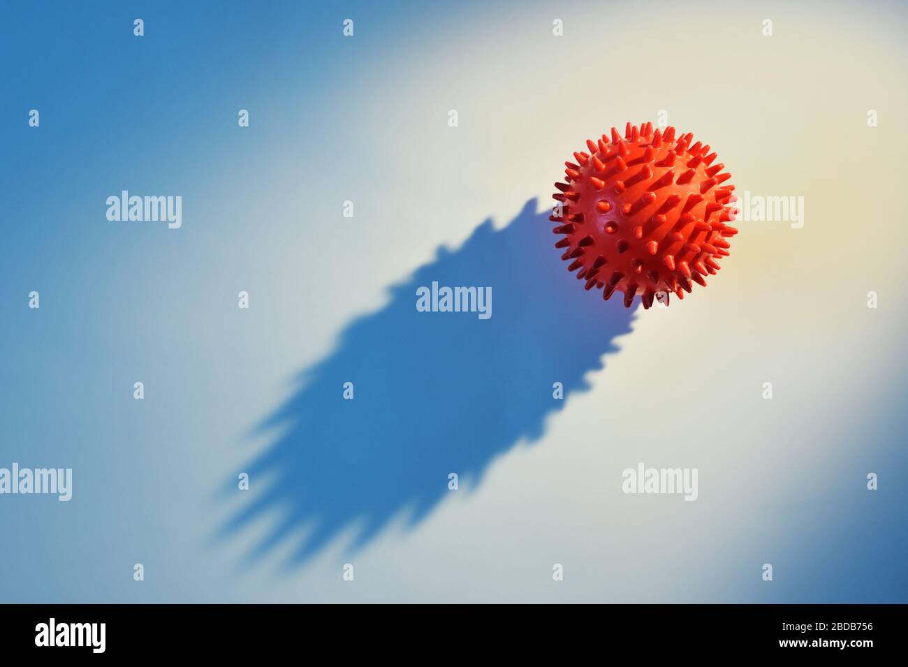 Virus strain red model of respiratory syndrome coronavirus with shadow and Novel coronavirus covid-19 with place for text background. Virus Pandemic Stock Photo