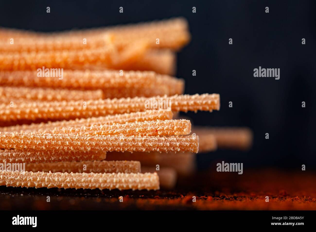 Spaghetti with chili and chili powder - close up view Stock Photo