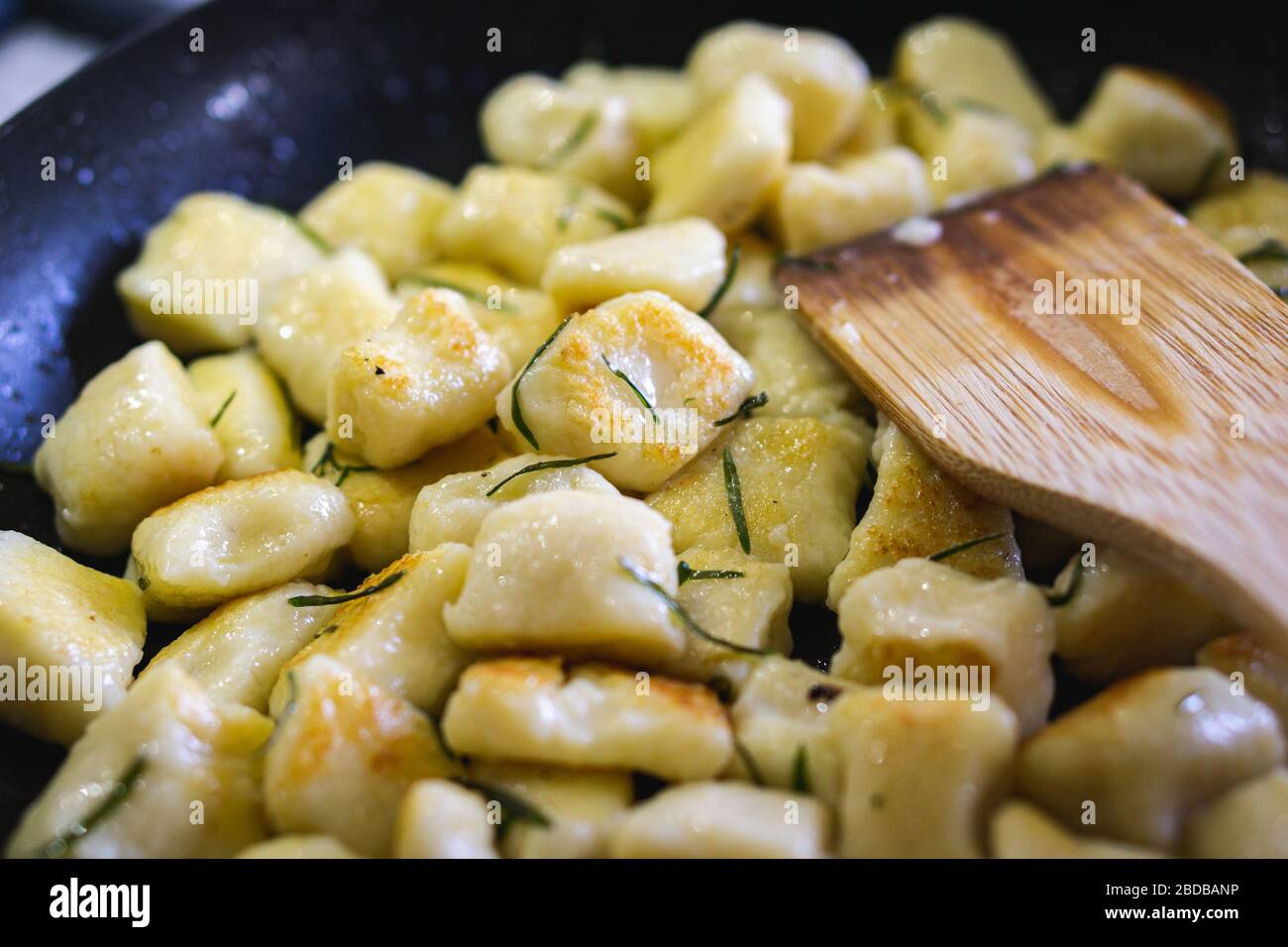 Home made gnocchi with goats cheese and parsley. Stock Photo