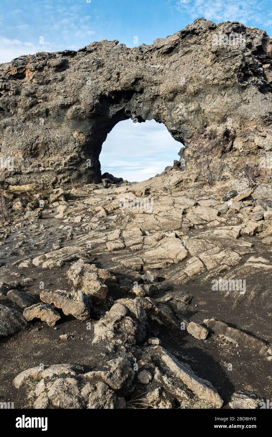 The Gatklettur Lava Arch, in the unique and surreal volcanic landscape of Dimmuborgir, near Lake Myvatn in north-east Iceland Stock Photo