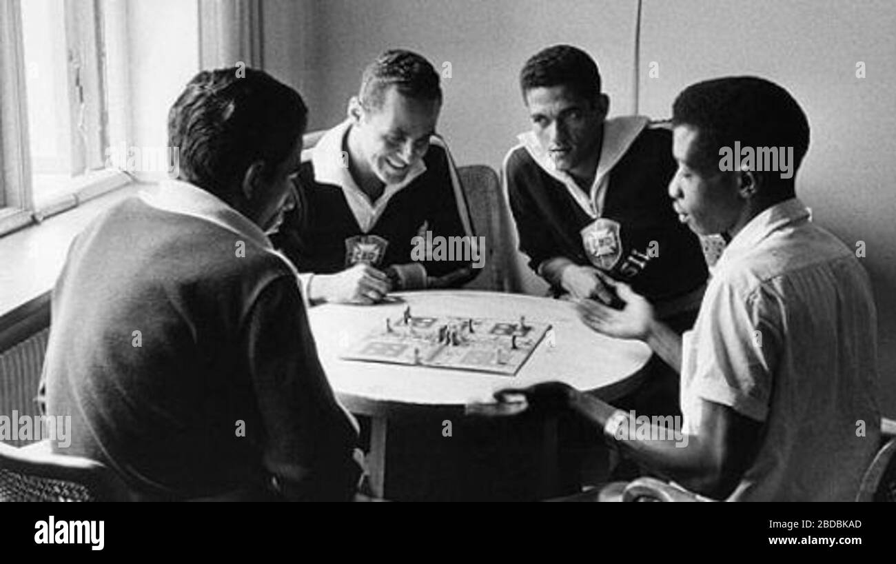 Gilmar and Garrincha signing autographs