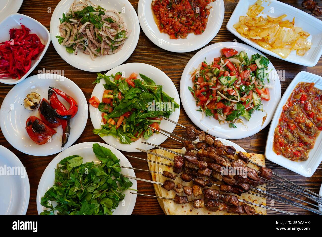 Liver Kebab The Table Is Also Served With Turkish Appetizers And Salad Varieties A Type Of Kebab Often Made In The Southern Provinces Of Turkey Off Stock Photo Alamy