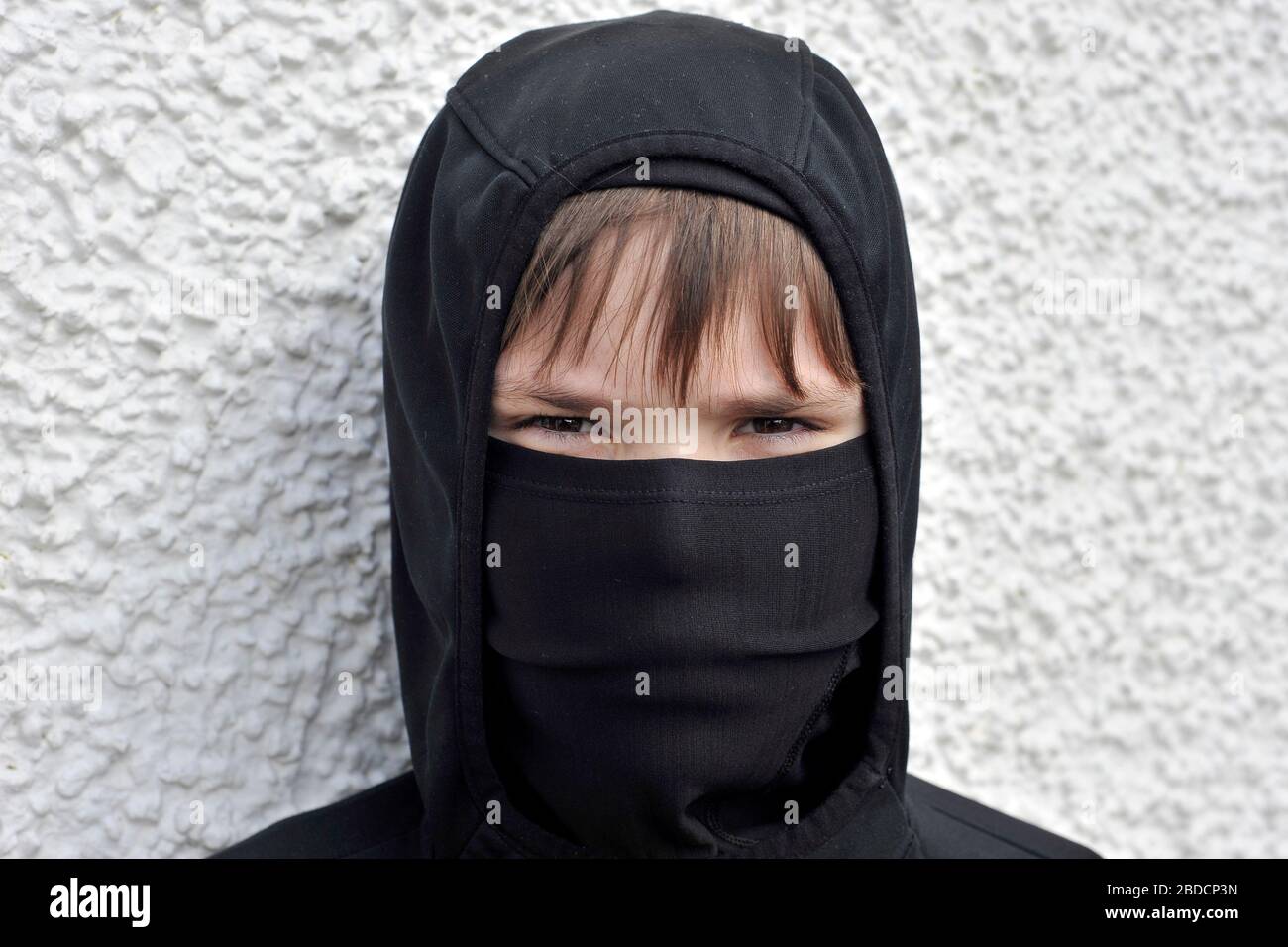 Boy in mask during coronavirus outbreak Stock Photo
