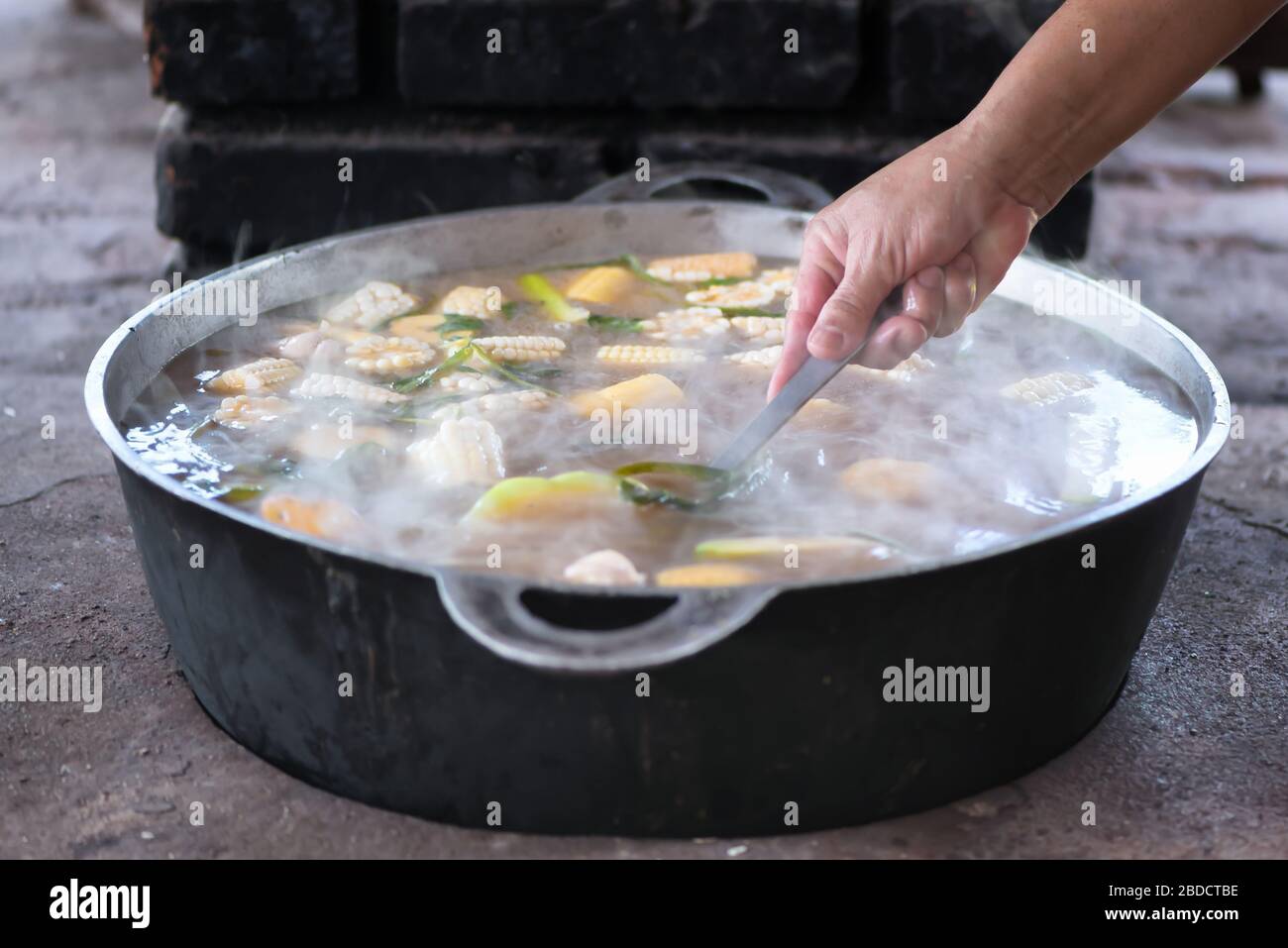 Cooking the olla de carne. Costa Rica food. Traditional food concept. Stock Photo
