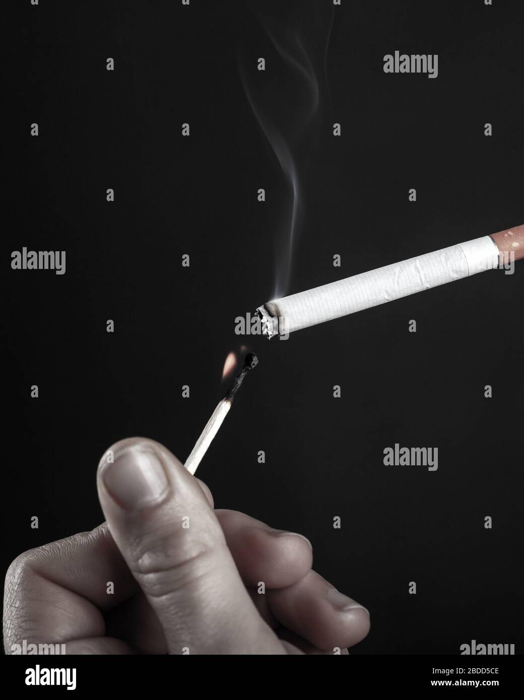 Lighting cigarette match hires stock photography and images Alamy