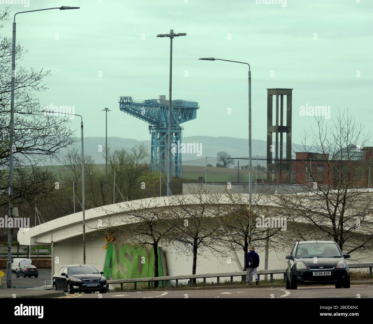 Glasgow, Scotland, UK, 8th April, 2020: Coronavirus saw deserted streets and Empty roads as people exercised on the Forth and Clyde canal.and the roundabout  road onin clydebank was not its usual end to end cars. Gerard Ferry/ Alamy Live News Stock Photo